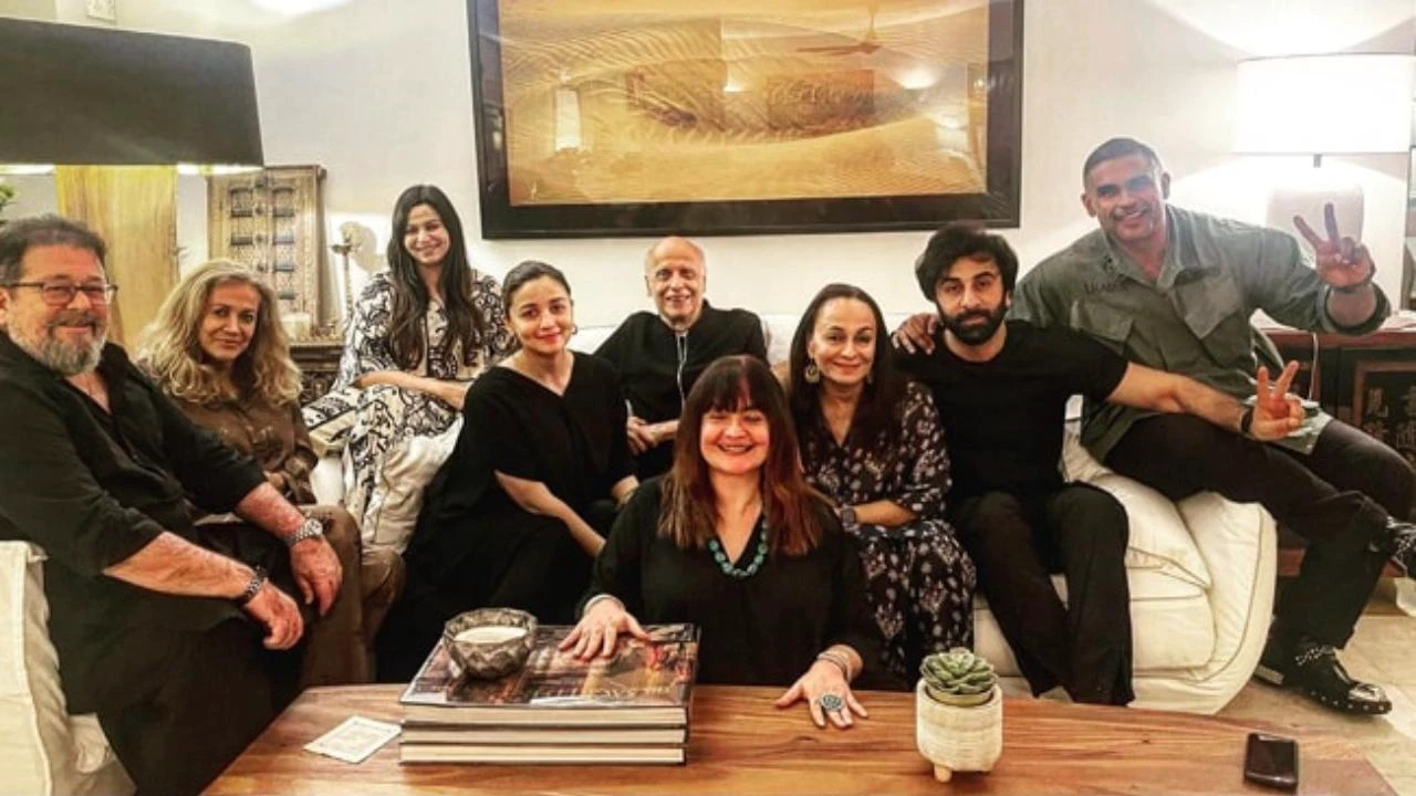 The couple pose with their family in the latest picture of parents-to-be Alia Bhatt and Ranbir Kapoor